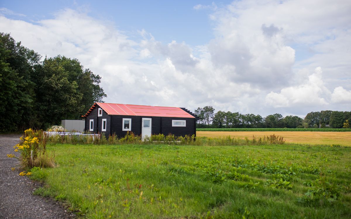 huisje in groene omgeving - Omgevingsborger waarborgt kwaliteit van bouwporject